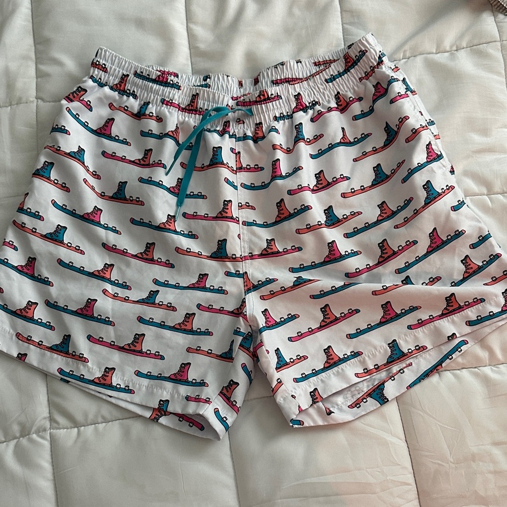 chubbies White Swim Trunks with Pink and Teal Skateboard Print